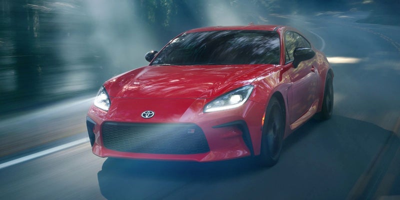 A 2024 Toytoa GR86 driving on a foggy day near Akron, OH