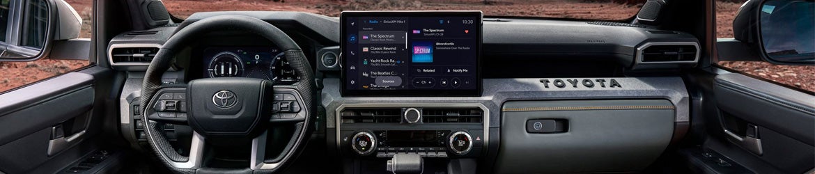 The infotainment system in the 2024 Toyota Tacoma in Akron, OH